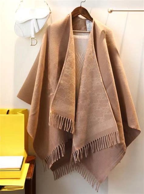 fendi karl poncho|Fendi poncho.